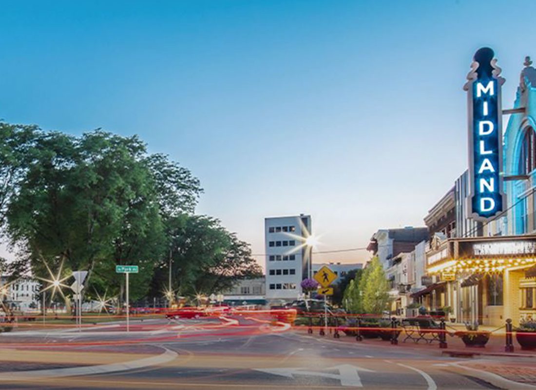 Contact - Ohio Small Town with Traffic and a Midland Theater at Sunset